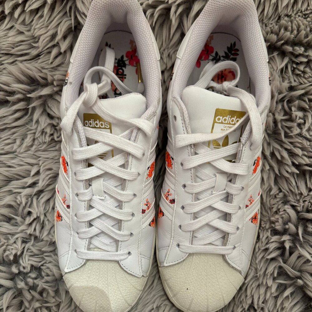 Adidas superstar with embroidered flowers